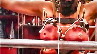Big-titted MILF in mask tortured BDSM style sex video
