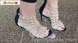 Red toenails trampling in studded sandals porn video online